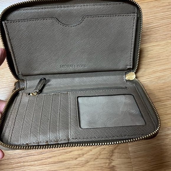 Michael Kors wristlet wallet taupe color good used condition. Gold slightly worn - Picture 6 of 6